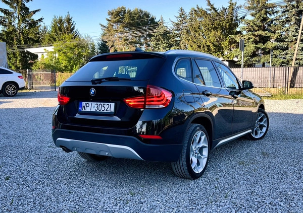 BMW X1 cena 49500 przebieg: 168200, rok produkcji 2013 z Piaseczno małe 781